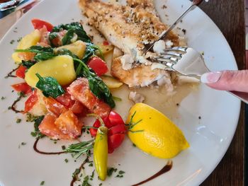 High angle view of breakfast served in plate on table