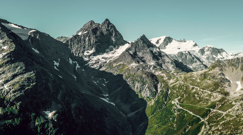 An aerial vista reveals the grandeur of a mountain peak overlooking the susten pass seen from wassen