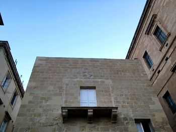 Low angle view of historical building against sky