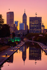 Illuminated buildings in city at night