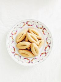 Directly above shot of cookies in plate on table