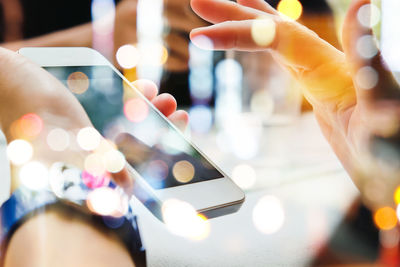 Close-up of hand holding smart phone