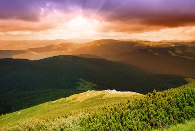 Scenic view of landscape against sky during sunset