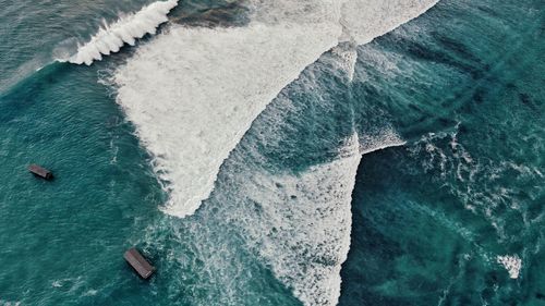 High angle view of sunlight falling on sea shore