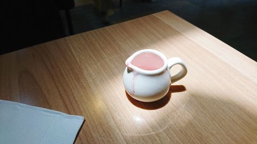 High angle view of coffee cup on table