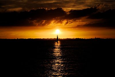 Scenic view of sea against sky during sunset