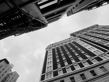 Low angle view of modern buildings against sky