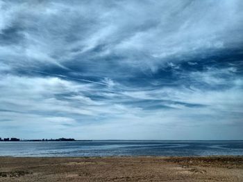 Scenic view of sea against blue sky