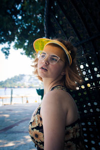 Portrait of young woman looking away