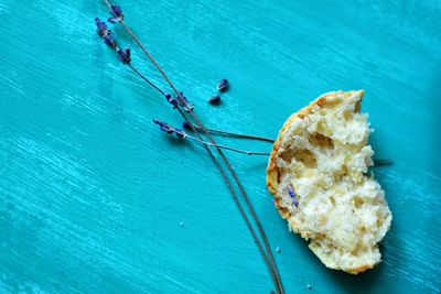 Close-up of bread with flower on table