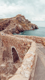 Scenic view of rock formations in sea