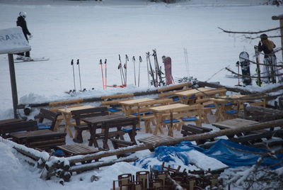 High angle view of people on snow covered land