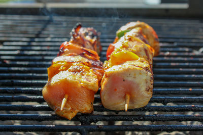 Close-up of meat on barbecue grill