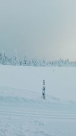 Scenic view of snowcapped landscape against clear sky