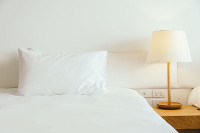 White pillow on bed at home