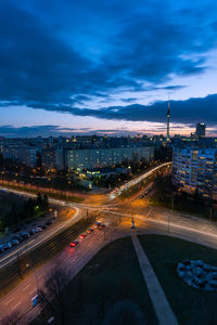 High angle view of intersected roads in city at night