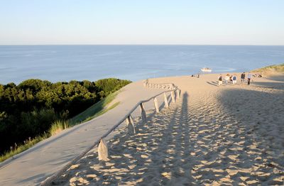 Scenic view of beach against clear sky