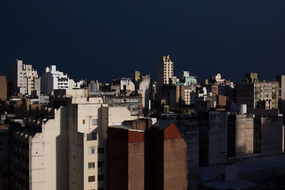 Cityscape against clear sky