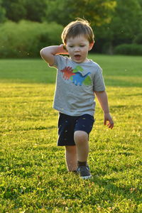 Cute boy on field