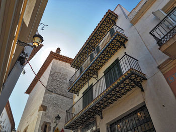 Low angle view of buildings against clear sky