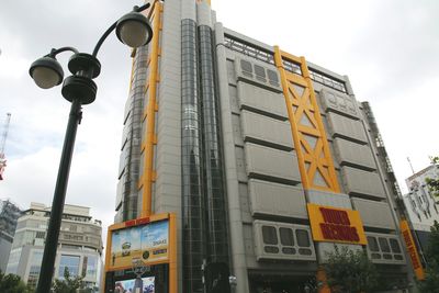 Low angle view of buildings in city against sky