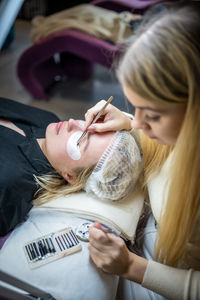 High angle view of woman at salon