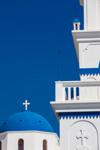 The church of holy cross in the central square of perissa on santorini island