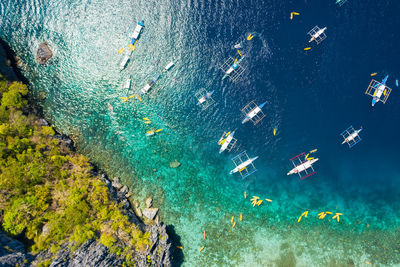 People swimming in sea