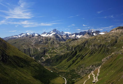 Panoramic view of landscape against cloudy sky