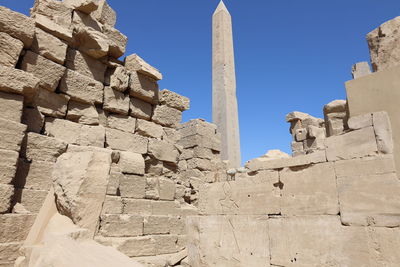 Low angle view of old ruins against clear sky