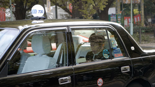 Reflection of city in a car