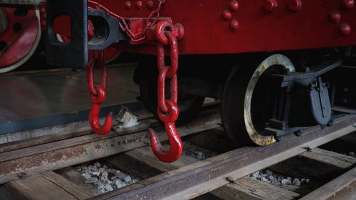 Low angle view of machine part of train