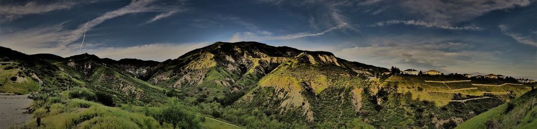 Panoramic view of mountains against sky