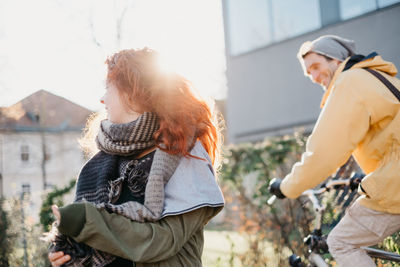 Young couple standing outdoors