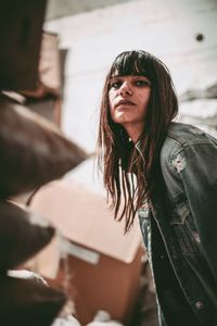 Portrait of woman looking away outdoors