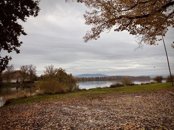 Scenic view of lake against sky during autumn