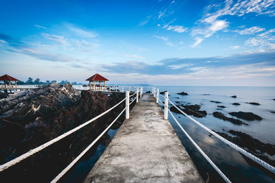 Scenic view of sea against blue sky