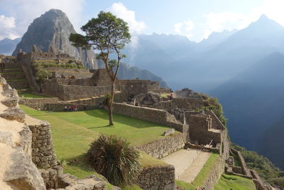 Built structure against mountain range