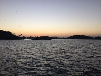 View of calm sea at sunset