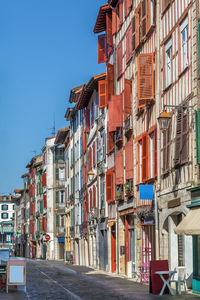 Street with historical houses in bayonne city center, france