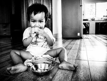 Portrait of cute boy eating food