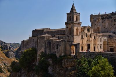 Low angle view of old ruins against clear sky