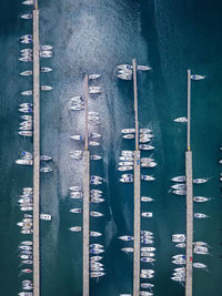 Boats moored at harbor