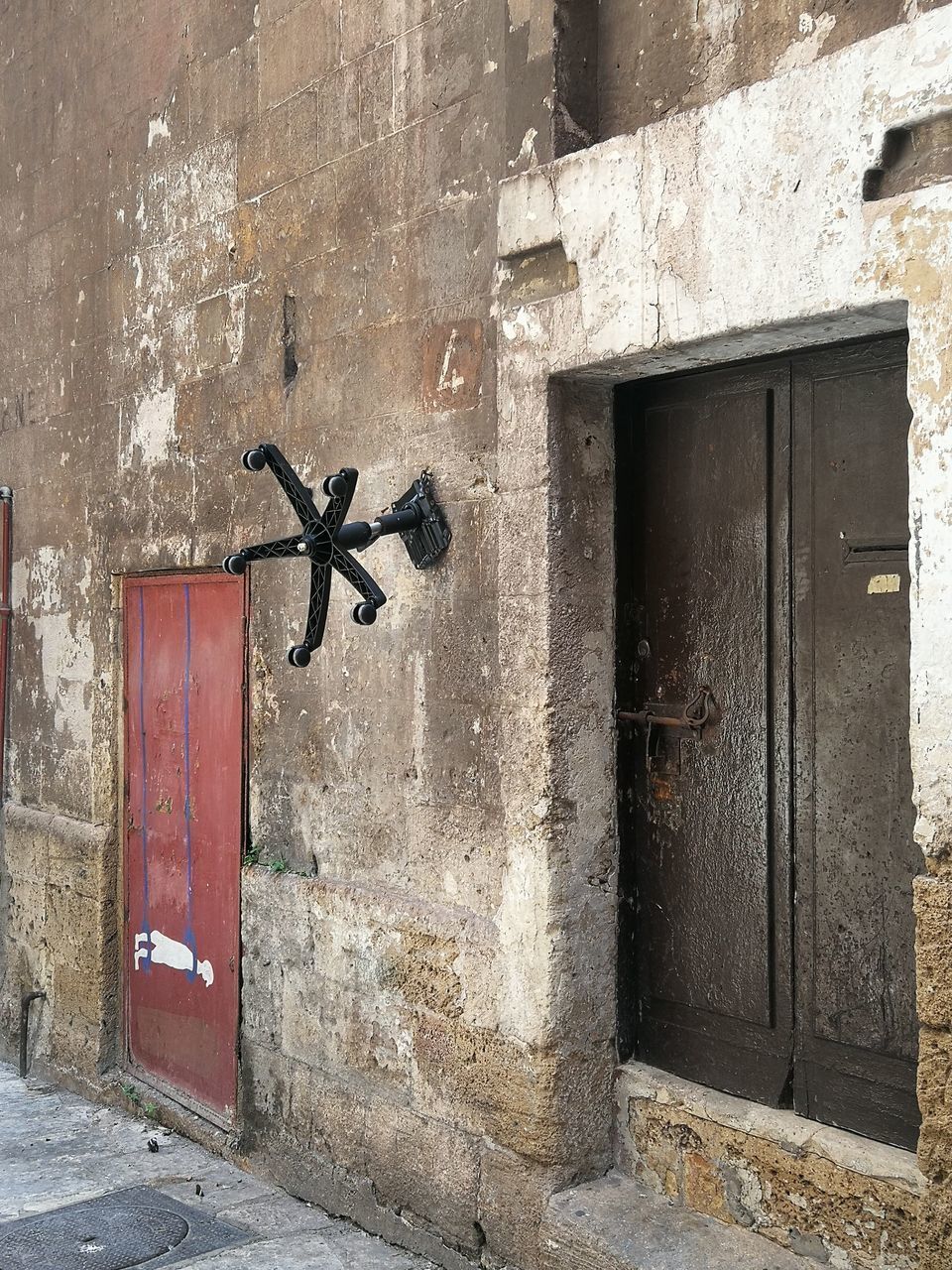 CLOSED DOOR OF OLD HOUSE