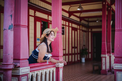 Portrait of young woman looking away