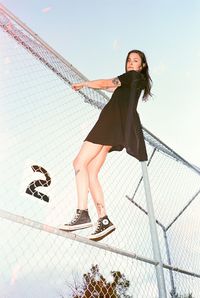 Low angle view of young woman