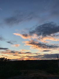 Low angle view of dramatic sky during sunset