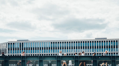 Low angle view of train on bridge against sky