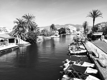 Scenic view of swimming pool by river against sky