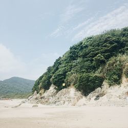 Scenic view of beach against sky